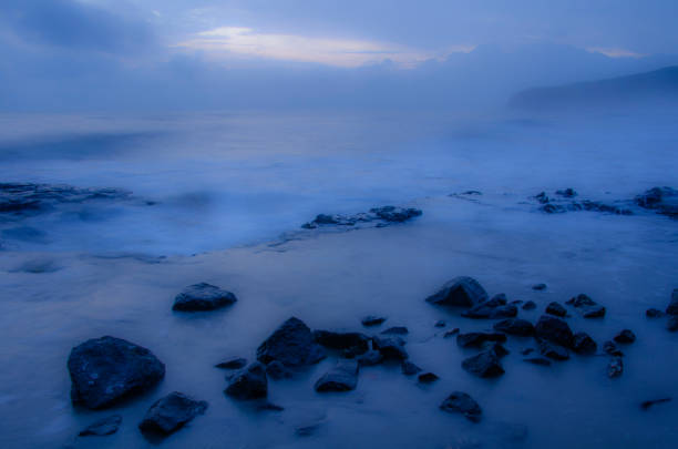 Beautiful seascape at sunset, amazing tropical nature background, sea, bay, waves, splashing