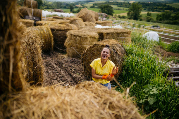 istock Women farmer and tractor 2163002912
