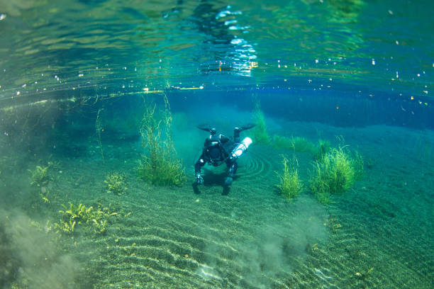 istock Diving in a crystal clear water 2163005876