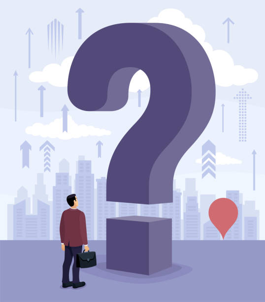 istock A Businessman standing in front of a large question mark, contemplating his next move. 2163006893