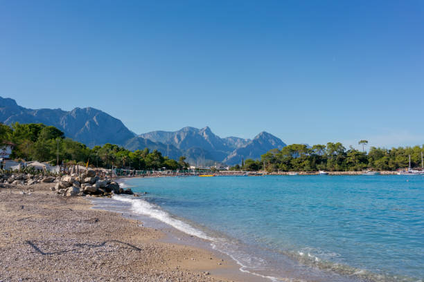 istock Scenic beach with mountains in the background on a sunny day. 2163011385