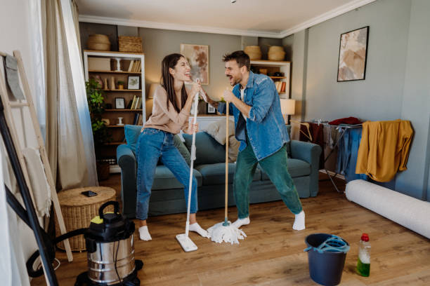 istock Cleaning the living room 2163011700