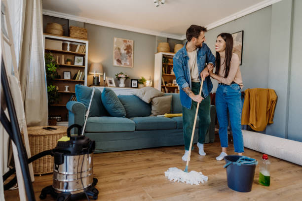 istock Cleaning the living room 2163011765