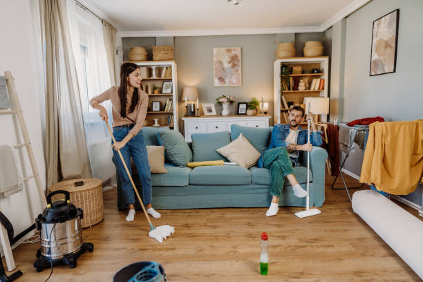 istock Cleaning the living room 2163011797