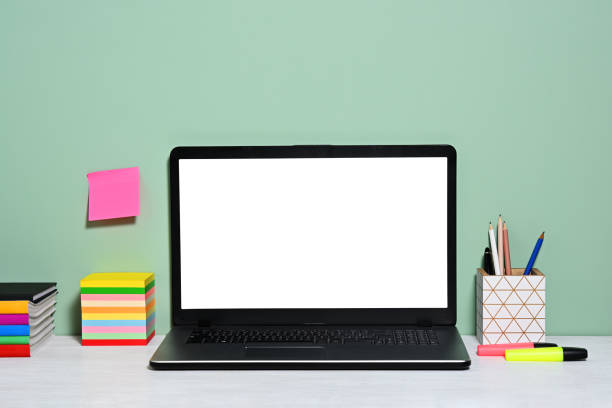 istock Laptop with white screen and office accessories 2163013612