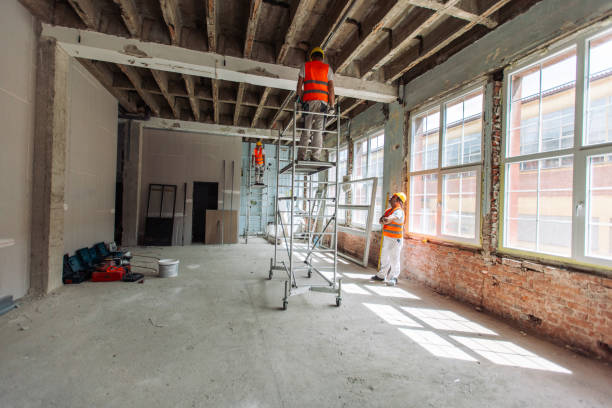 istock Building renovation with safety gear and scaffolding visible 2163013830