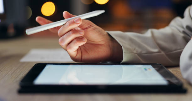 istock Hand, office and night with tablet and pen with graphic designer on sketching app for website in creative agency. Person, employee and art development for company brand, online project and display 2163014851