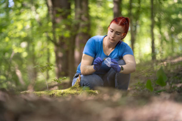 istock A young female biologist scientist taking plant sample 2163015551