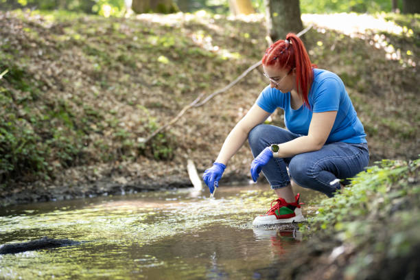 istock A young female biologist scientist taking water sample 2163015675