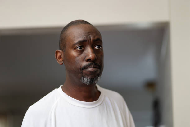 A portrait of a black man sad