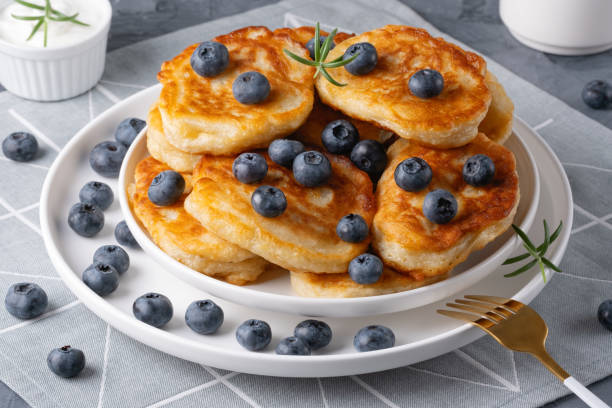 istock Homemade mini pancakes with blueberries 2163017329
