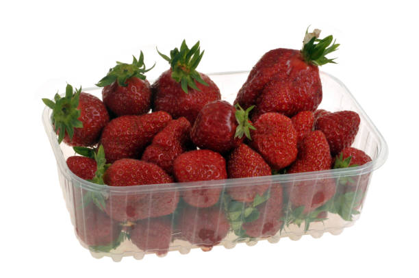 istock Strawberries tray isolated on white 2163017754