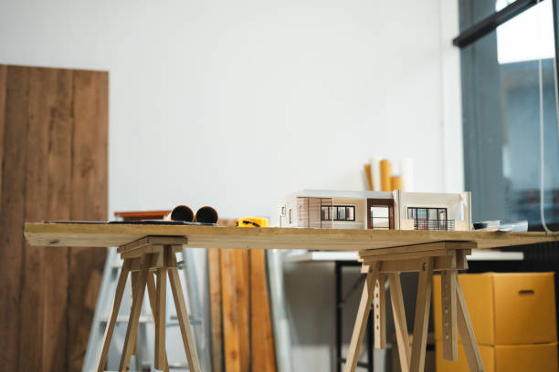 istock Construction house and building. Repair work. dof laptop computer and office construction on table in office blurred background.Architect concept. 2163019155