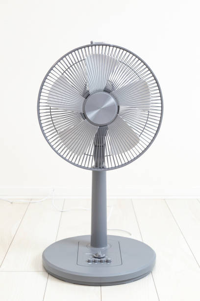 istock Electric fan in a white room 2163019419