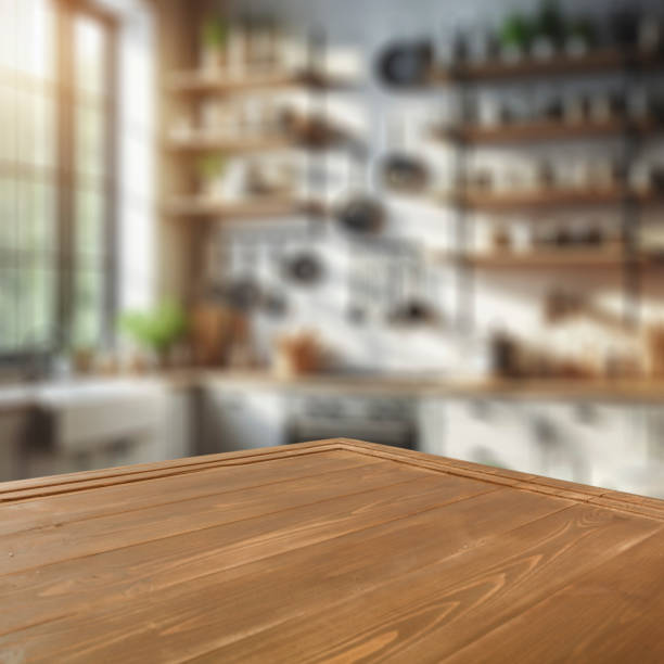istock Empty wooden table with copy space for products. Blurred bright kitchen interior background. 2163020533