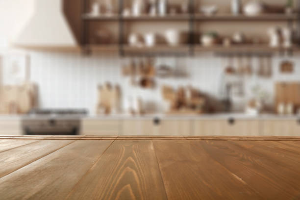istock Empty wooden table with copy space for products. Blurred bright kitchen interior background. 2163020718