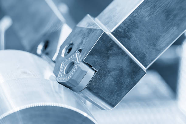 istock Close up  the  chip insert on the lathe machine in the light blue scene. 2163024623