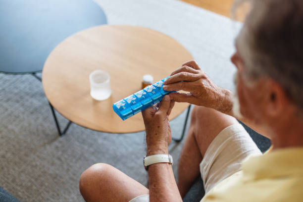istock Senior Caucasian Man Organizing Medication 2163025377