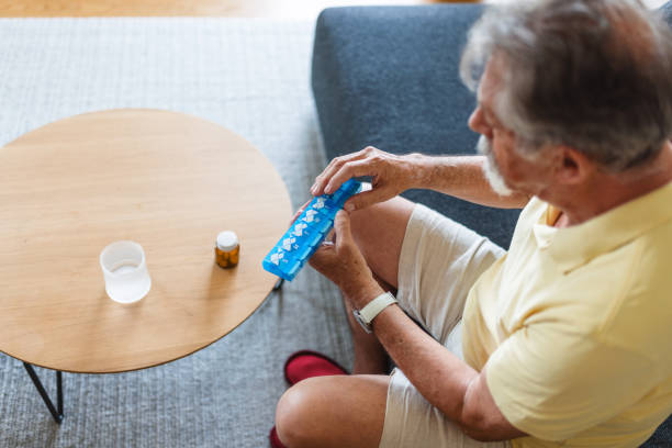 istock Caucasian Senior Man Organizing Medication 2163025513
