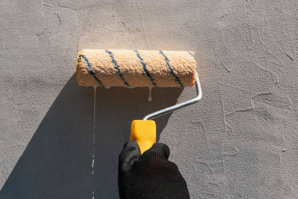 istock Wall priming. Applying primer with a roller on the wall 2163026062