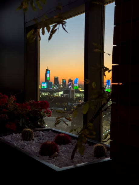 Cityscape at sunset in Tashkent, from a modern building in the downtown area, near Amir Temur Square. Tashkent City development in the background, with the country’s tallest buildings.