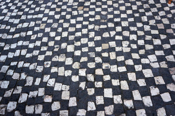 Geometric Checked Pattern in Traditional Mosaic Portuguese Paving Tiles in Sintra, Portugal.