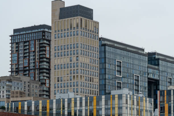 istock Industrial construction cranes work above new modern building. 2163033025