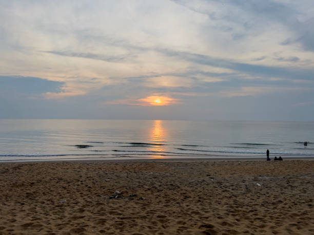 istock Serene sunrise over the calm waters. 2163033903