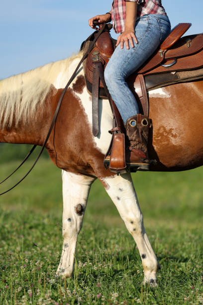 istock Western girl riding 2163036419