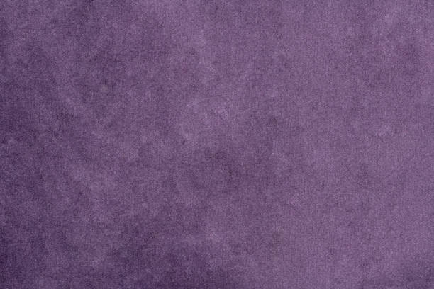 istock Purple colored  velvet background fabric with elegant texture 2163037368