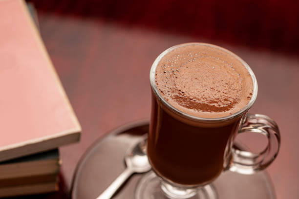 istock Cup of hot chocolate on a wooden table. 2163040895