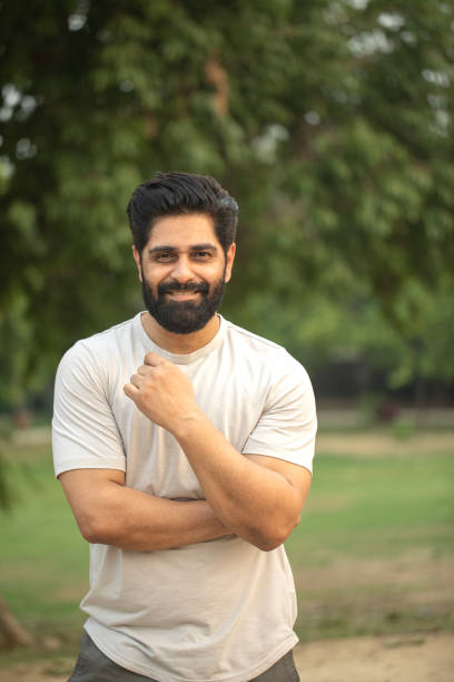 istock Happy young man posing in garden 2163041221