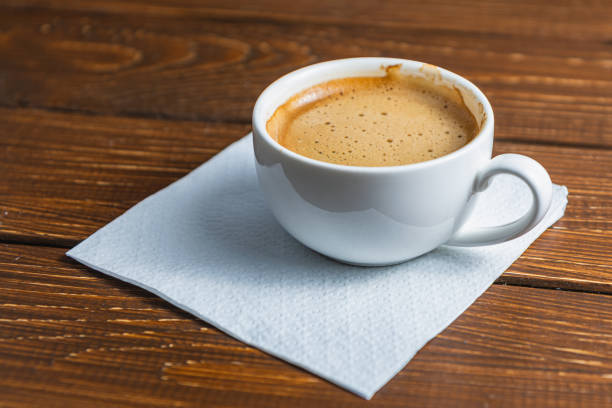 Hand written note on a coffee stained napkin with an empowe High quality photo