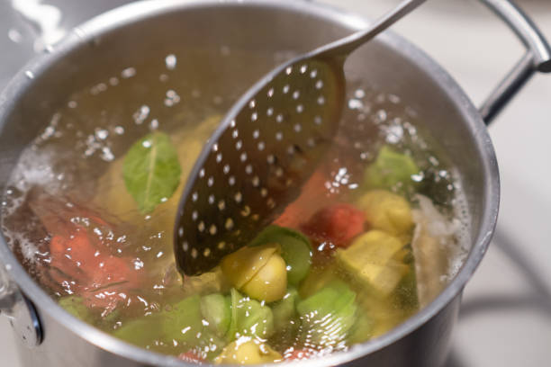 Delicious homemade soup in a plate at home, lunch time.