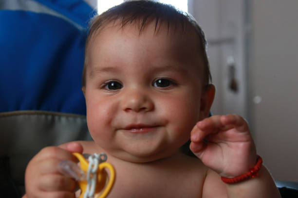 portrait first tooth growing baby happy smiling positive emotions