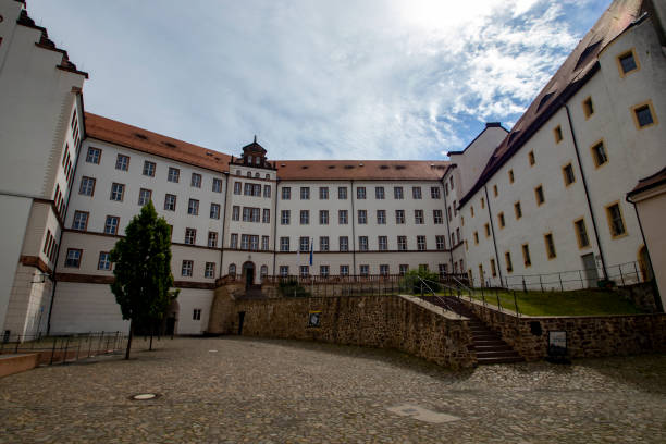 Colditz, Germany - 12th July 2024: The historic Colditz Castle overlooking the town of Colditz, Germany