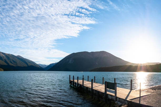 istock Tranquil Mountain Lake with Wooden Dock 2163057180