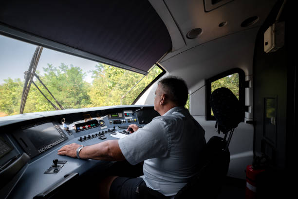 istock Locomotive engineer in the train control cabin 2163058713