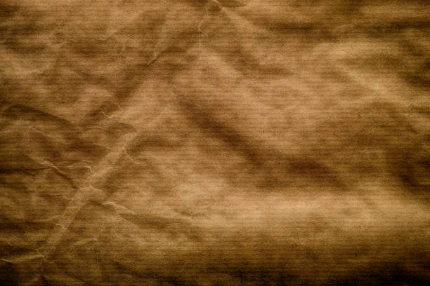 A Brown Texture Background. Crumpled Paper. Close up.