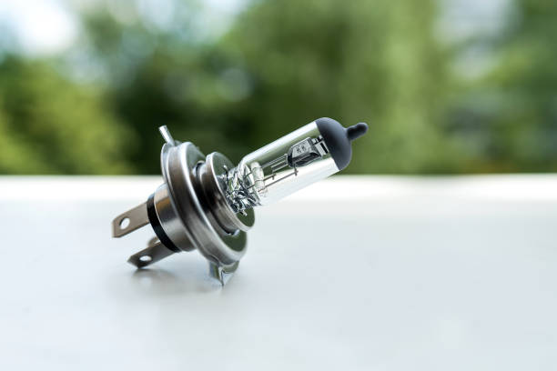 car H7 headlight bulb on white desk a