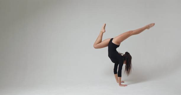 istock Barefoot ballerina in studio 2163073623