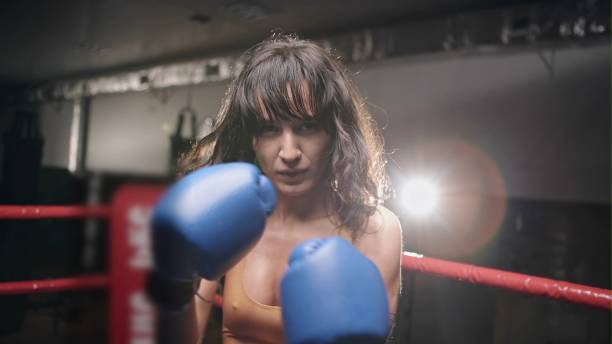 istock Young boxing girl doing exercises 2163073720