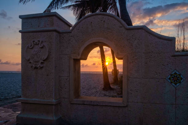 sunrise on Hollywood Beach, Fl with a portal in the foreground