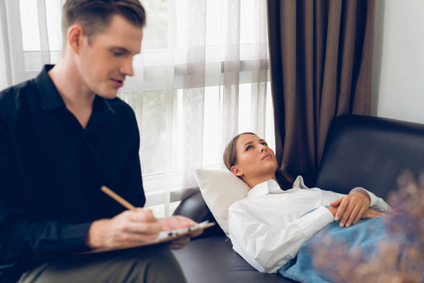 istock Stressed and depressed patient seeking help from psychiatrist. Unveiling 2163077821