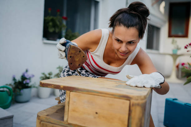 istock Women sanding old furniture 2163081439