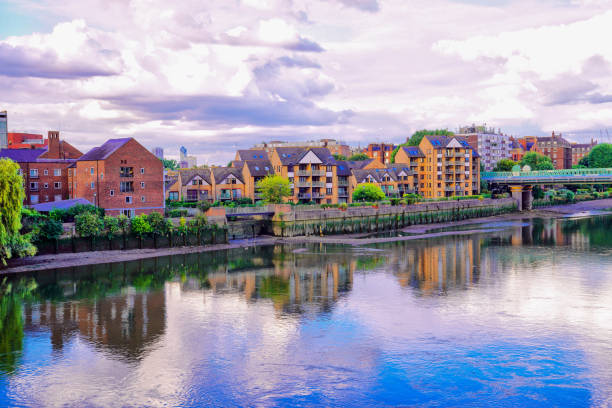 View from the footbridge in Caversham of the River Thames running through Reading, Berkshire one morning
