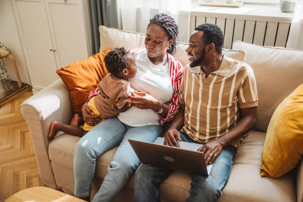 istock Young family online shopping 2163084255