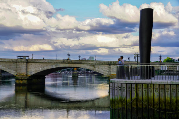 Putney Bridge, London, UK - July 20, 2024. Putney Bridge, looking towards River Thames & the Riverside Walk in Putney.