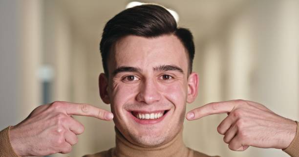 istock Joyful Young Man Showcasing His Healthy Smile 2163097903