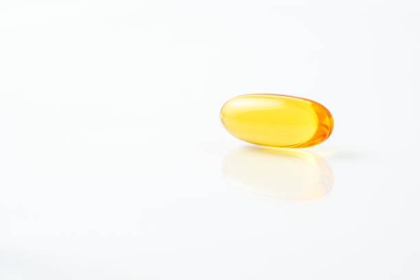 istock Softgel capsules 3D, fish oil, supplement on with background 2163100418